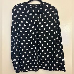 Back and white polka dot v-neck blouse. Size L